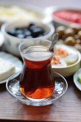 Turkish style breakfast: eggs, chechil cheese, white cheese, kashar cheese and Turkish tea