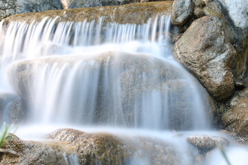 Naklejka premium waterfall in the mountains long exposure 