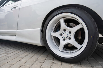 Close-Up of Custom Car Wheel and Tire Excellence. 