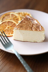 San Sebastian cheesecake on plate in restaurant in close-up	