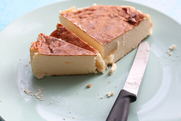 San Sebastian cheesecake on plate in restaurant in close-up	