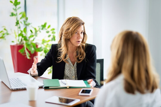 Group of business people having a meeting in a modern office