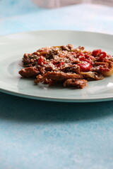 Close-up Asian style mushroom dish with sesame seeds