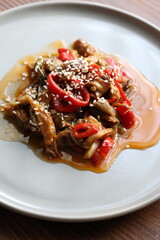 Close-up Asian style mushroom dish with sesame seeds