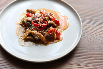 Close-up Asian style mushroom dish with sesame seeds