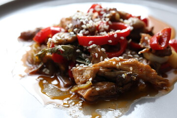 Close-up Asian style mushroom dish with sesame seeds