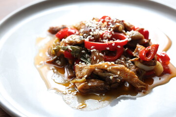 Close-up Asian style mushroom dish with sesame seeds