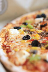 market pizza with salami and olives