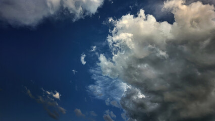 Storm clouds in the blue sky