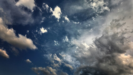 Storm clouds in the blue sky