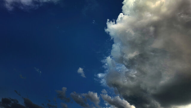 Storm clouds in the blue sky