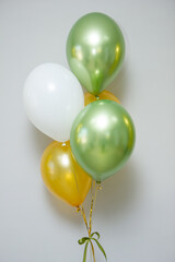 green and gold helium balloons, green chrome balloons for the holiday