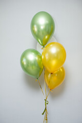 green and gold helium balloons, green chrome balloons for the holiday