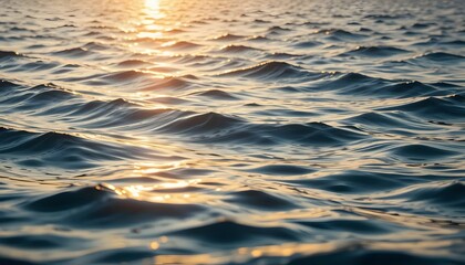 Ocean surface with rhythmic wave lines under golden sunlight, tranquil mood, close perspective