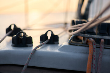 Sailing regatta in the Gulf of Finland at sunset, sailing yacht competing in a race, splashing...