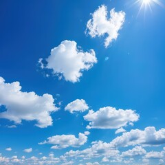 Fototapeta premium a serene day under a clear blue sky dotted with fluffy white clouds. the sun shines brightly in the top right corner, casting light across the landscape.
