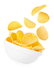 Tasty crispy potato chips falling into bowl on white background