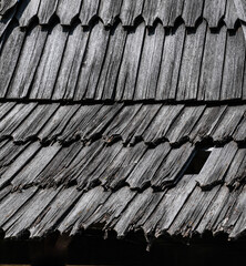 old broken wooden roof tiles