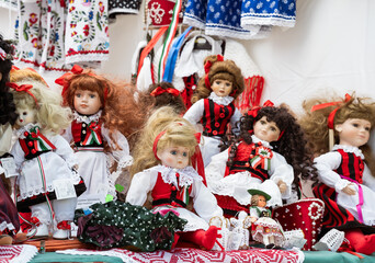 small dolls with sekler traditional red clothes