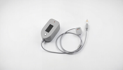 Fototapeta premium Medical monitoring device with attached cable on white background 