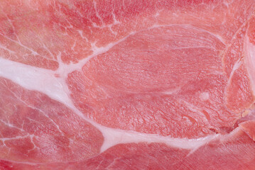 Jamon meat as background macro photo.