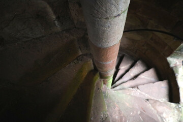 Old spiral staircase inside an medieval castle in England, UK