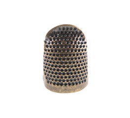vintage copper thimble isolated on white background