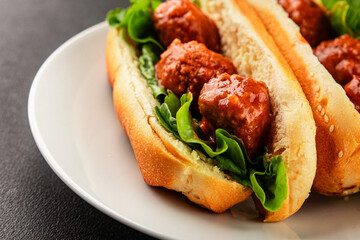 Meatball sandwich fast food meat dish fresh delicious gourmet food background on the table rustic food top view copy space