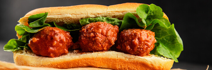 Meatball sandwich fast food meat dish fresh delicious gourmet food background on the table rustic...