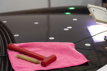 Tool for straightening the car body a car repair shop