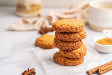 Homemade peanut or almond butter cookies or oatmeal cookies on white kitchen background. High quality photo