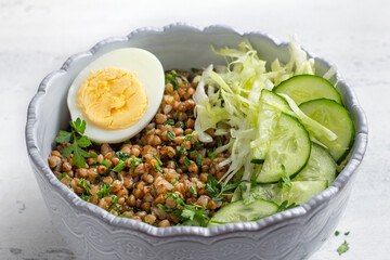 Nutritious Buckwheat Bowl with Fresh Cucumber, Cabbage, and Egg