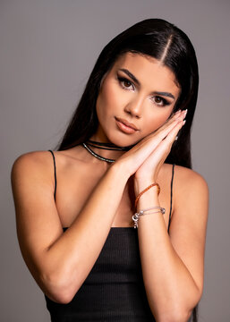 Beautiful teen young woman portrait in studio with perfect natural skin and make up