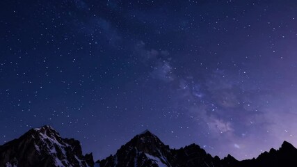 Night sky over majestic mountains, crescent moon and stars - Powered by Adobe