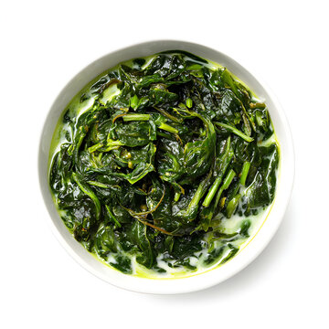 Single serving of callaloo with visible greens and coconut milk swirl over a pure white background