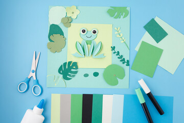 Colorful craft supplies with scissors and glue on desk, perfect for kids workshop visuals, education kits, toy packaging, art class ads, creative product promotion, DIY content marketing