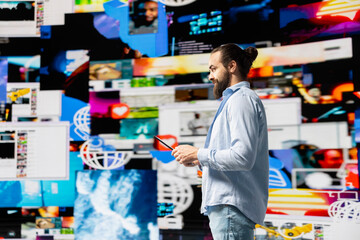 Young influencer connecting on a social network in the digital world, global social media audience. Man investing in tools for storytelling and branding to build influence and engagement.