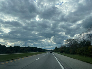 storm clouds over the highway road