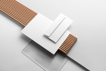 Corporate identity stationery mockup isolated on a sleek modern background, showcasing branding elements, sharp lines, minimalistic design, soft shadows. 3D design. Branding corporativo mockup