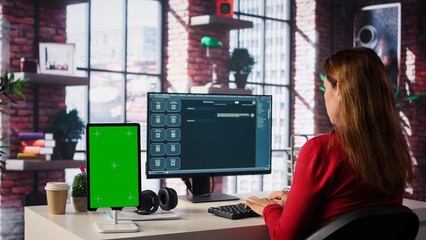 Freelancer interacting with smart AI virtual assistant next to mockup screen, using innovative...