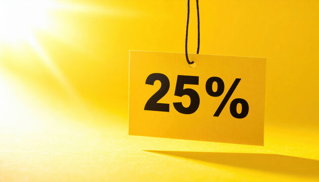 Price tag with bold 25% discount hangs against vibrant yellow background, illuminated by bright light, creating inviting and cheerful atmosphere