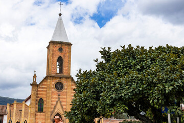 Fototapeta premium Raquira, Boyaca - Colombia. May 11, 2025. Saint Anthony From the Wall Parish is a Colombian Catholic church.