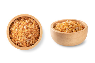 Fried garlic in wooden bowl isolated on white background. Close up