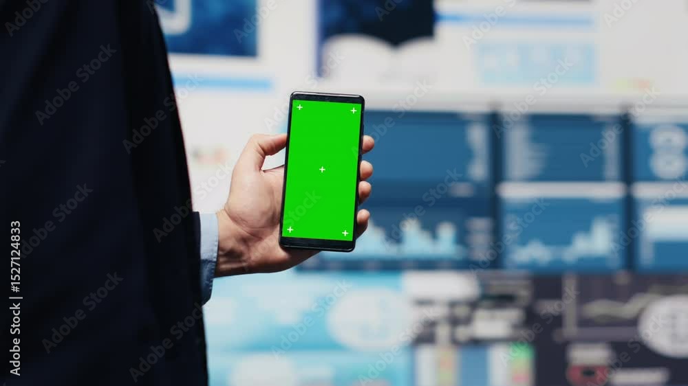 Poster male administrator uses green screen phone to explore new growth strategy with insight and analytics