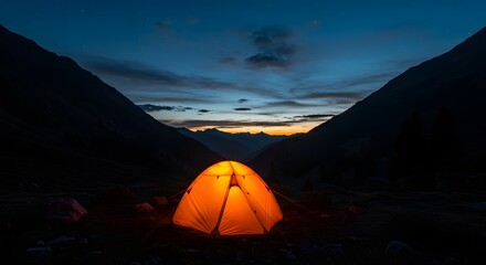 Illuminated Camping Tent at Night in Mountains Under a Starry Sky