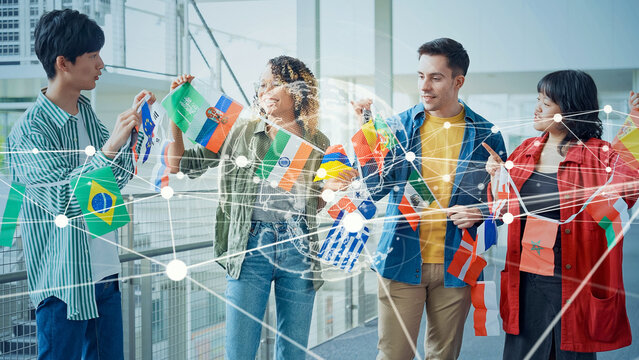 Multinational people holding international flags and global network
