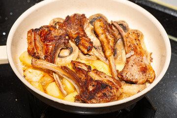 cooking homestyle pan-seared lamb chops with mushrooms and potatoes
