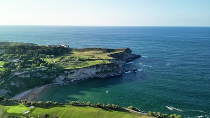 Breathtaking Aerial View of a Scenic and Picturesque Coastal Landscape Featuring a Lighthouse