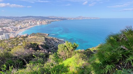 Experience the Stunning Coastal View that Overlooks the Beautiful Turquoise Waters of the Ocean