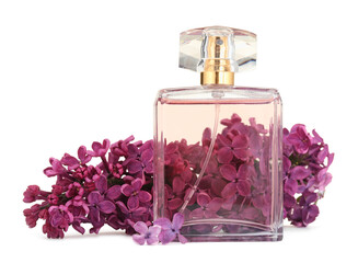 Bottle of luxury perfume and lilac flowers isolated on white